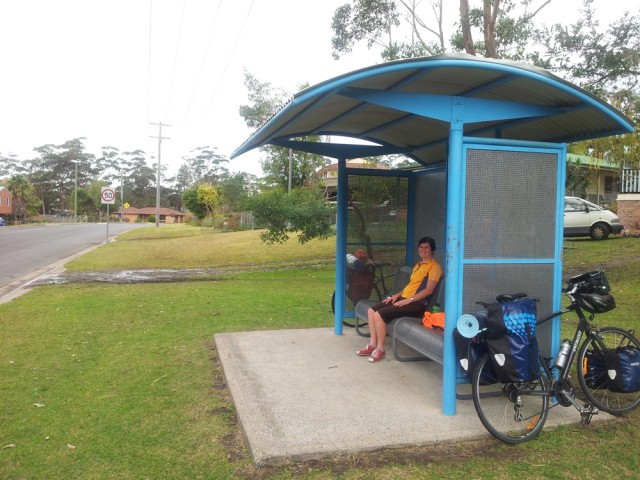 Lunching in a bus shelter