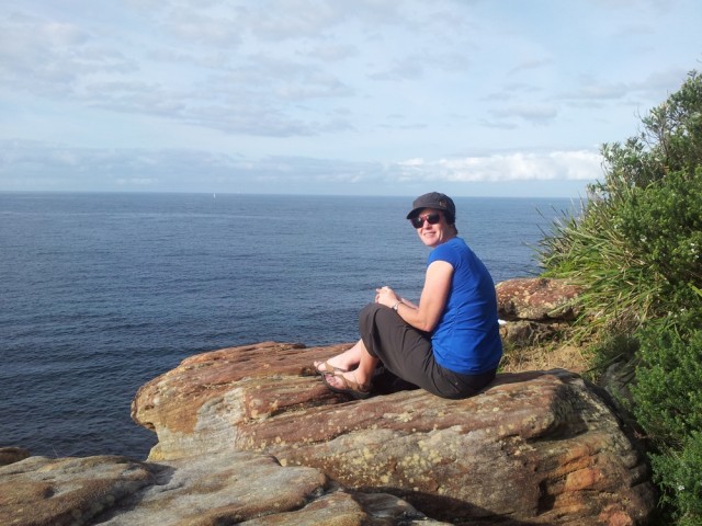 Jen eating lunch looking at the whales.